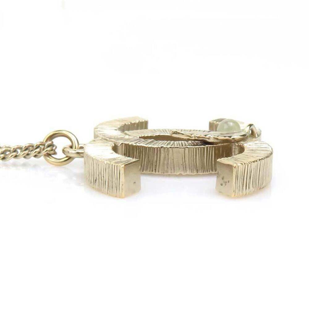 CHANEL Gold Logo Necklace - Picture 2 of 5